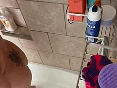 Mature mommy Danie gets naughty in the shower