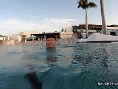 Outdoor swim: See-through one-piece bathing suit reveals mature milf in public pool
